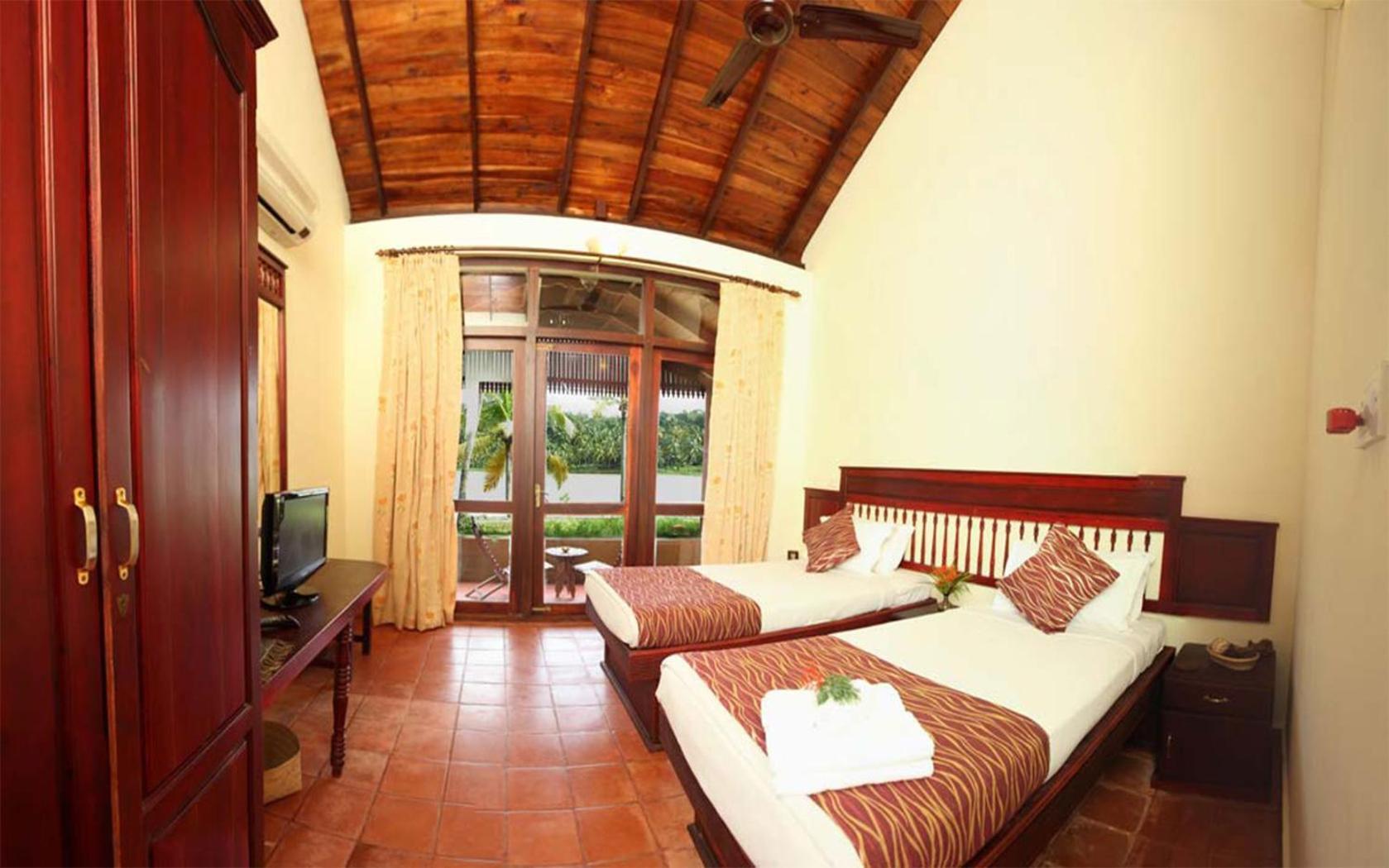 Fragrant Nature Backwater Resort & Ayurveda Spa Kollam Quarto foto